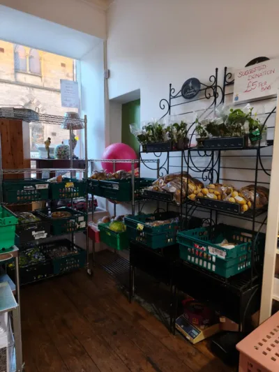Shelves stocked with food in crates